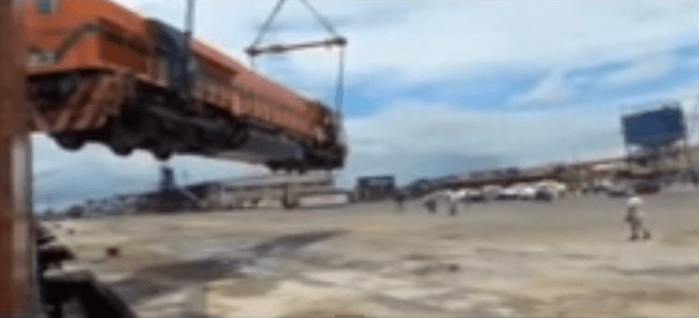 Raw Video: Large Locomotive Dropped While Unloading From Ship
