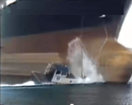 Raw Video: Ship Drops Anchor On Tug Boat, Man Overboard