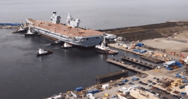 Britain’s Biggest Ever Warship HMS Queen Elizabeth Takes to The Water for The First Time