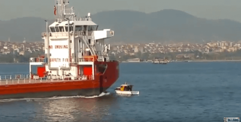 Watch: Small Boat Collides With Cargo Ship