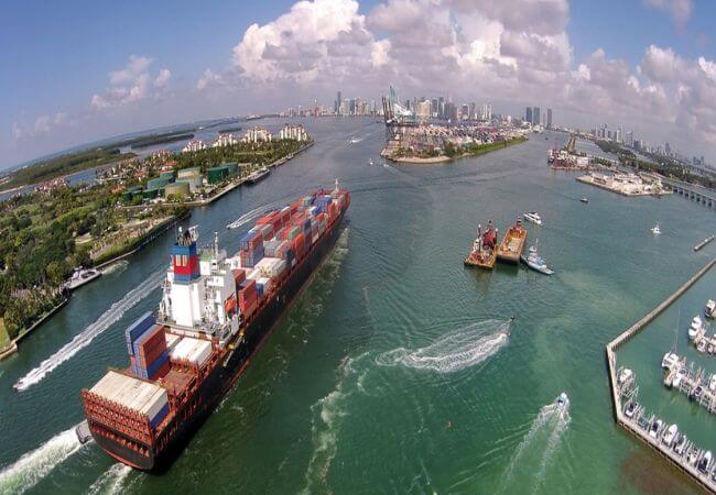 Cargo ship enters port of Miami-Dade aerial view