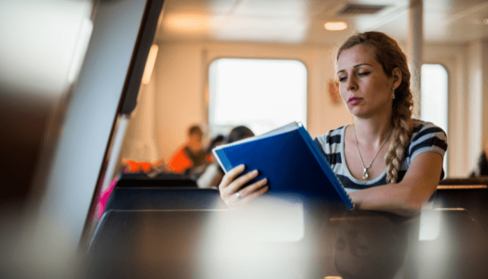 reading book at ship