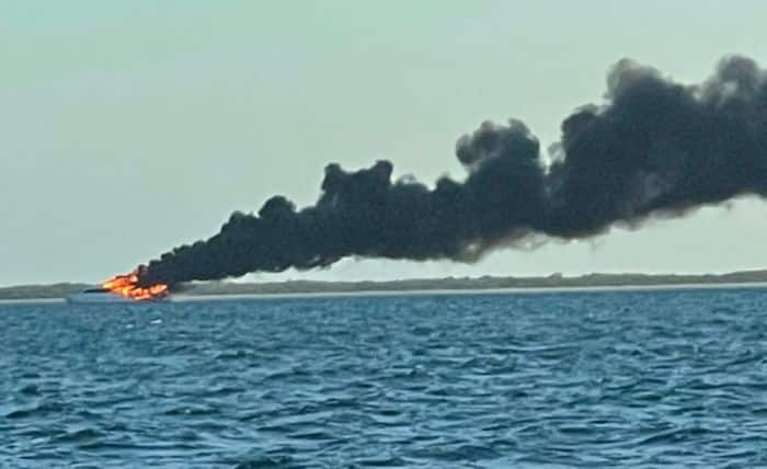 Photos: USCG Oversees Diesel Spill Clean-Up After Vessel Fire Near Marquesas