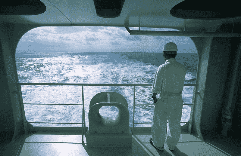 Seafarer gazing at the sea