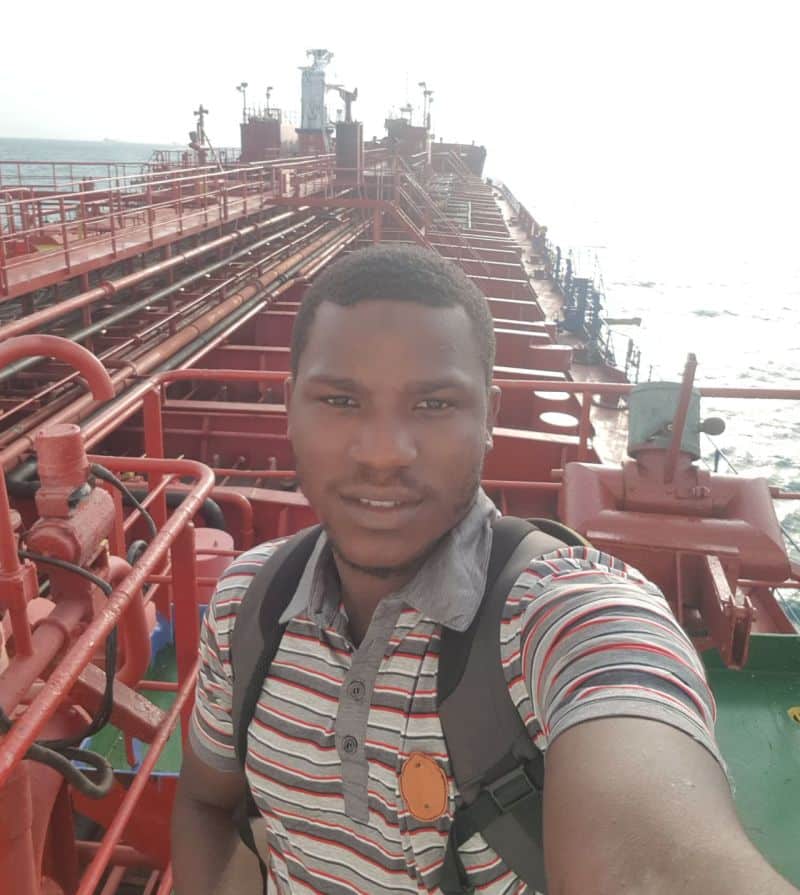 Gafar Olatunde at the ship he worked on