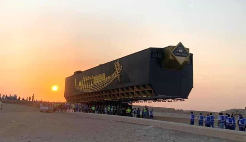 The first ship of King Khufu being transported through rail (half of it is in the air)