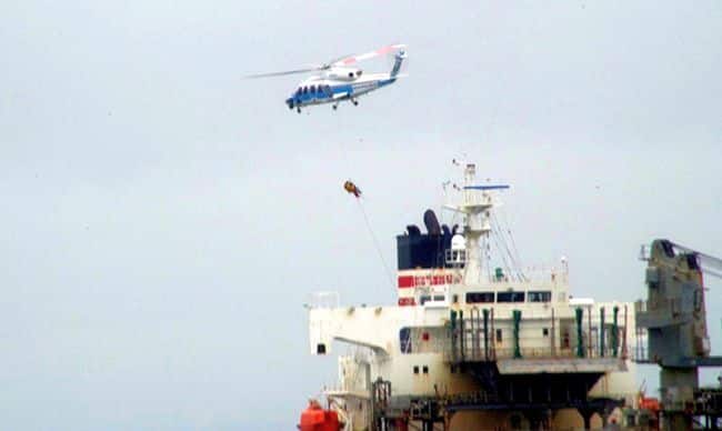 Crew being rescued from Woodchip carrier Crimson Polaris by Japan Coast Guard