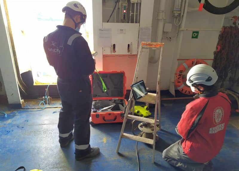 MaDfly and BV surveyors carry out system checks with underwater drone