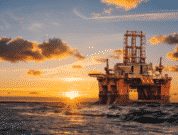 View of an oil rig during sunset