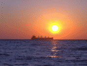 cargo ship sunset