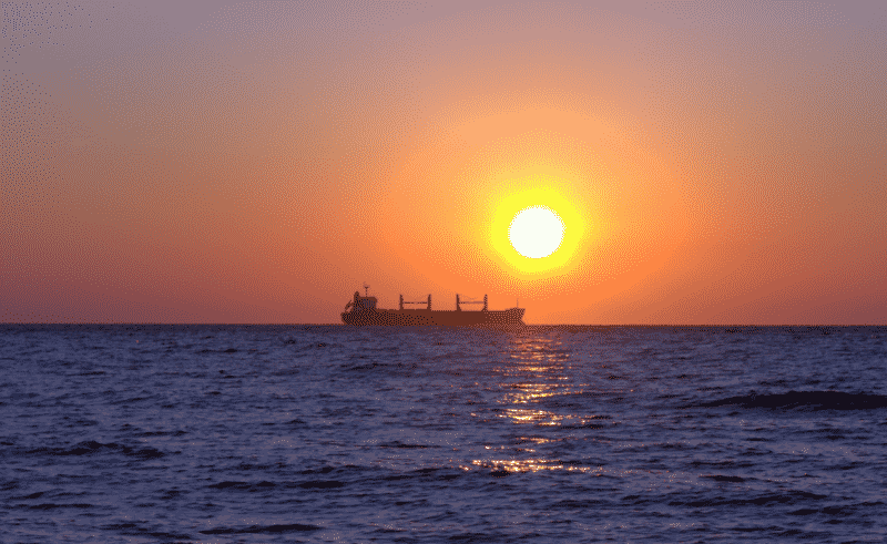 cargo ship sunset