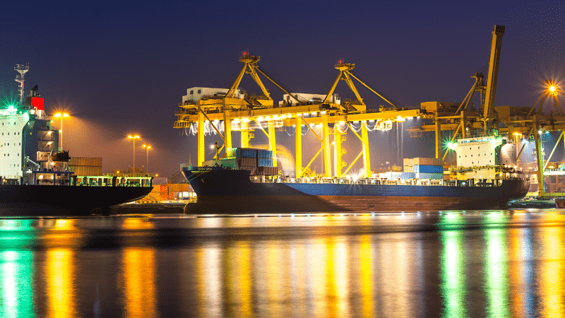 ships berthed in port at night