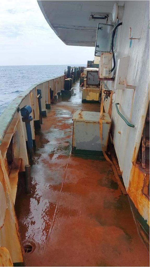 The ship is in a poor condition with some cracks below the waterline. The seafarers are pumping water out night and day. (Credit ITF)The ship is in a poor condition with some cracks below the waterline. The seafarers are pumping water out night and day. (Credit ITF)