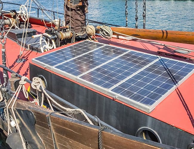 Solar panels on board a sailing yacht in vintage style.