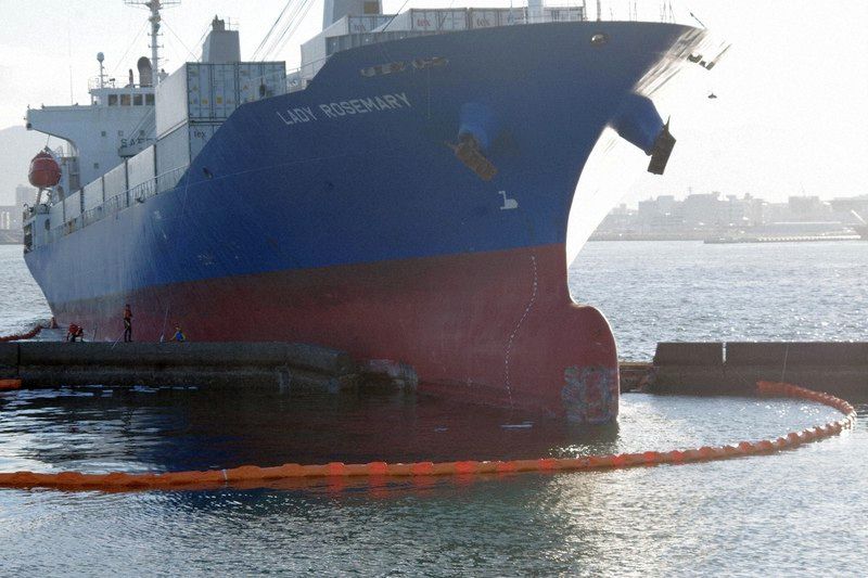 A cargo vessel is seen after it collided with a breakwater. - Photo courtesy of the Fukuoka Coast Guard Office