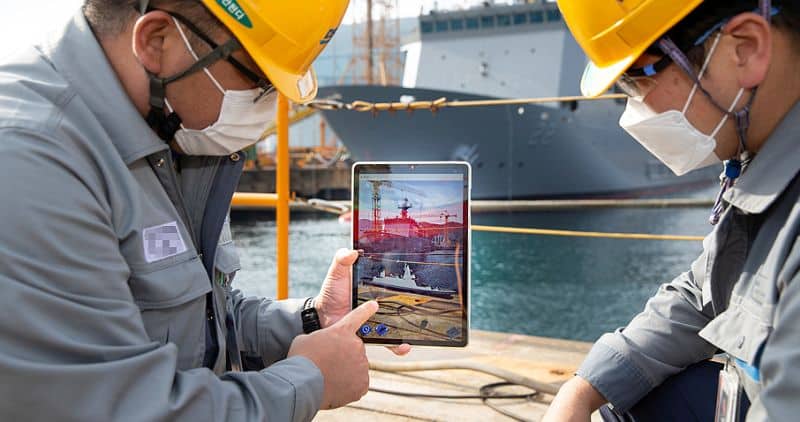 DSME employees are working by comparing a real ship with a virtual ship implemented with a Mixed Reality (MR) system