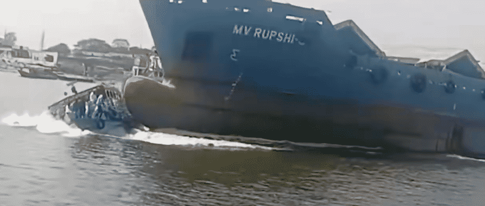 bulk carrier runs over ferry