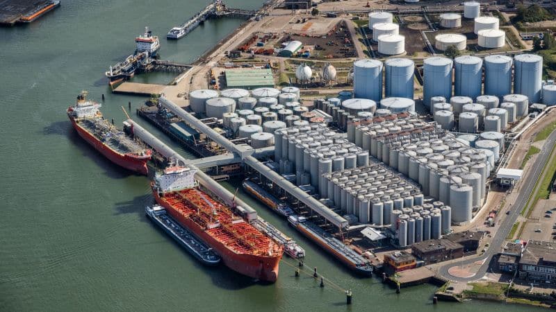 Aerial,View,Of,Oil,Tankers,Moored,At,An,Oil,Storage