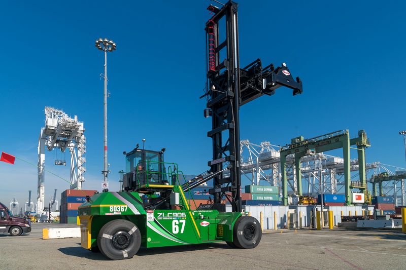 A Taylor electric zero-emissions “top-handler” at Pacific Container Terminal on Pier J in the Port of Long Beach. Marine terminal operators and longshore workers at the Port are demonstrating cleaner cargo-handling equipment at every terminal.