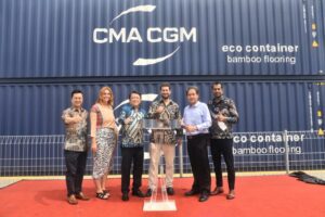CMA CGM execs in front of its containres