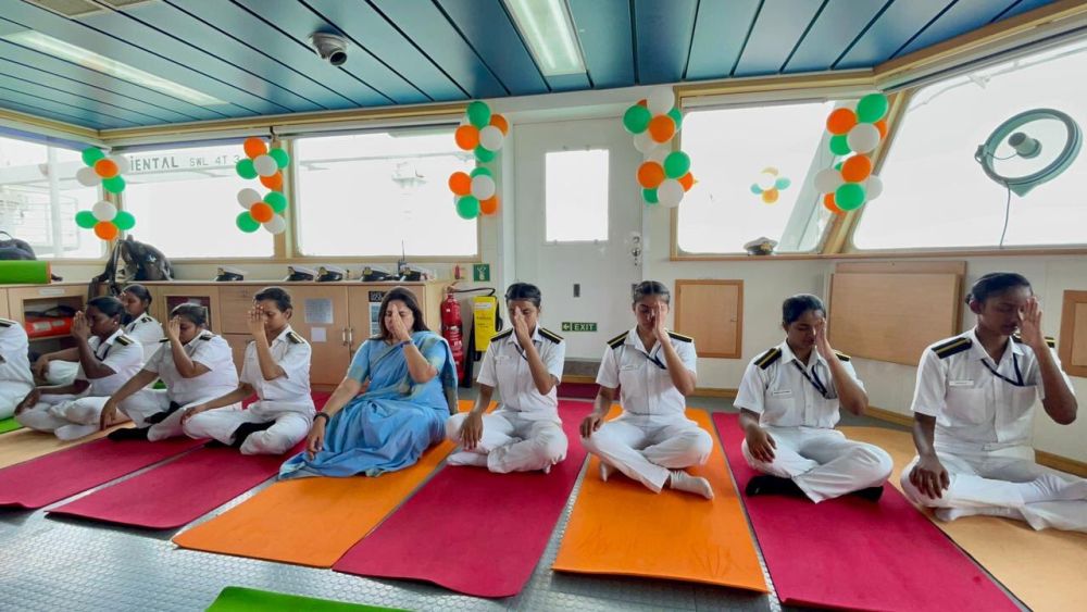 all women crew doing yoga onboard