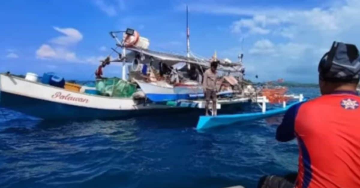 A Chinese ship collides with a Filipino fishing boat, leaving 5 crew members suffering in the water