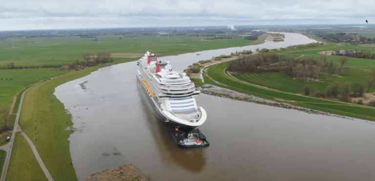 Watch: Giant Disney Cruise Ship Maneuvers Through Impossibly Narrow River