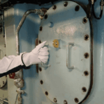 Real Life Incident: Solo Handling Of 28.5 Kg Under-Piston Hatch Cover Results In Hand Injury