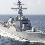 US Navy Destroyer USS Frank E. Petersen Returns To Hawaii After 300 Days At Sea